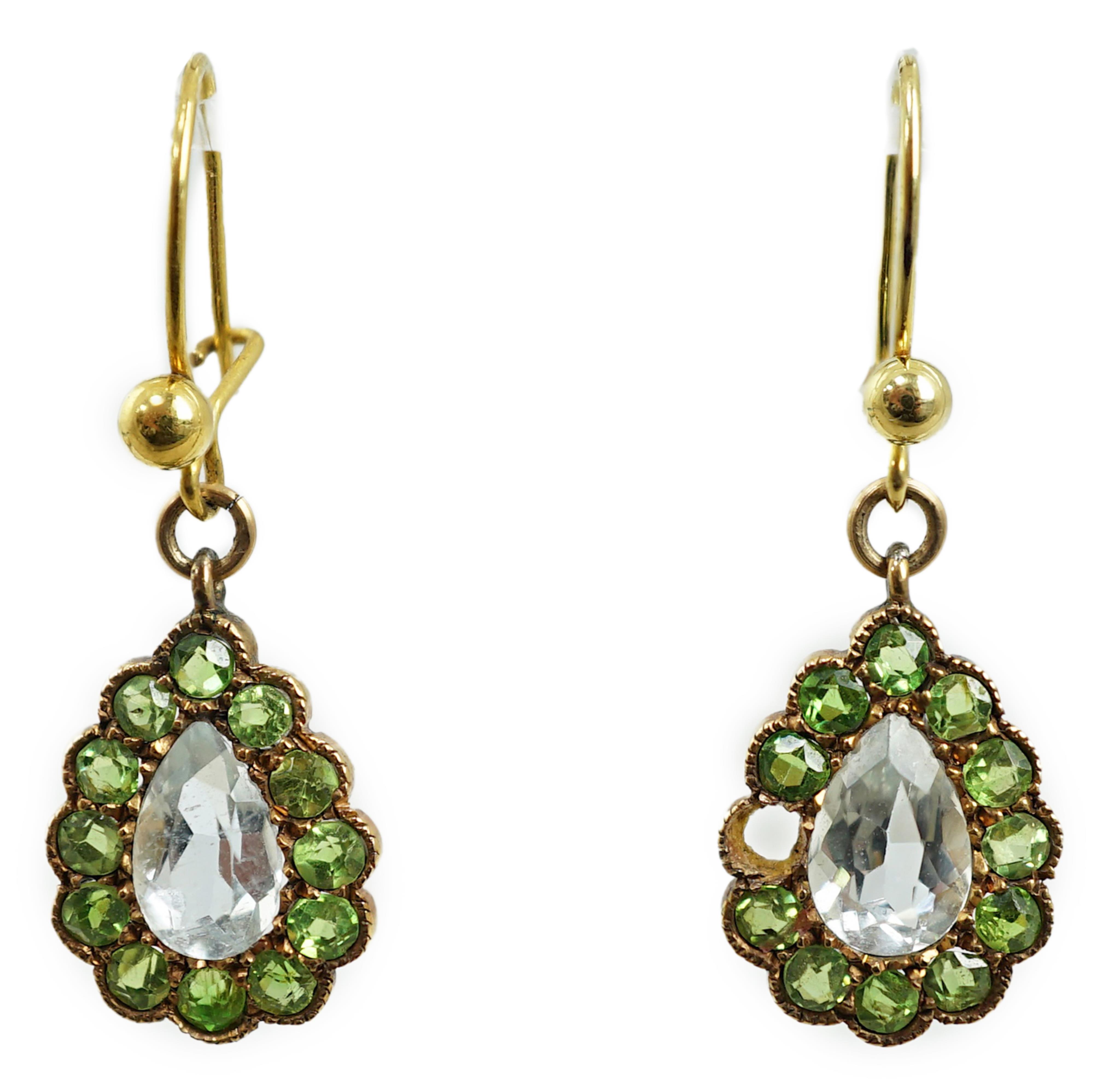 A pair of late Victorian yellow metal, aquamarine and demantoid garnet cluster set pear shaped drop earrings